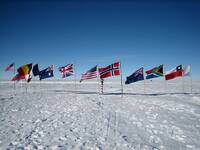 Flags at the Ceremonial South Pole.jpg